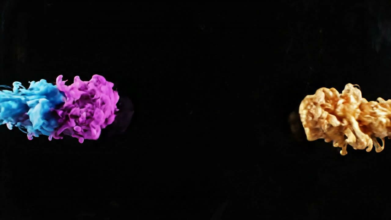 Colorful Ink Smoke Swirling on Black