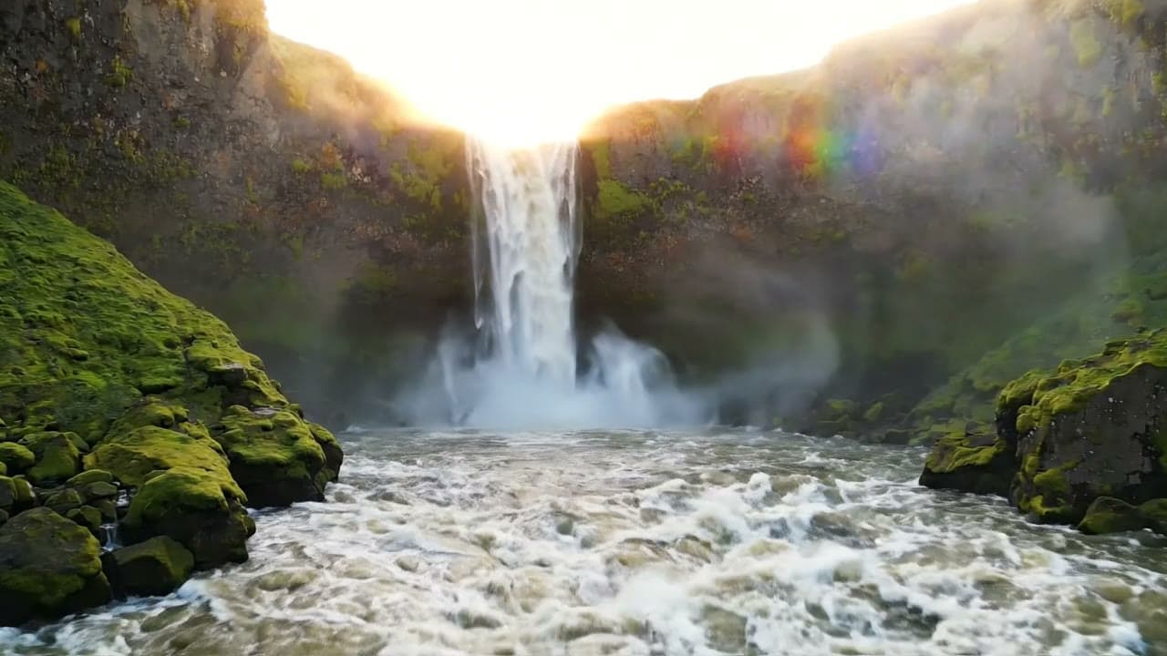Waterfall Cascading Down Mossy Cliffs — Free AI Stock Video